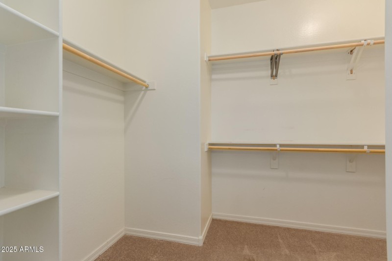primary bedroom walk in closet