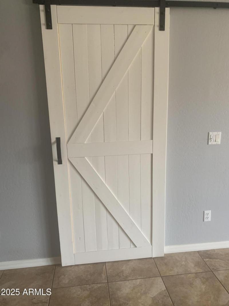 Barn Door Leading to Laundry & Pantry