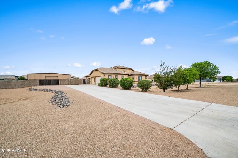 Driveway leading to Shop & Home