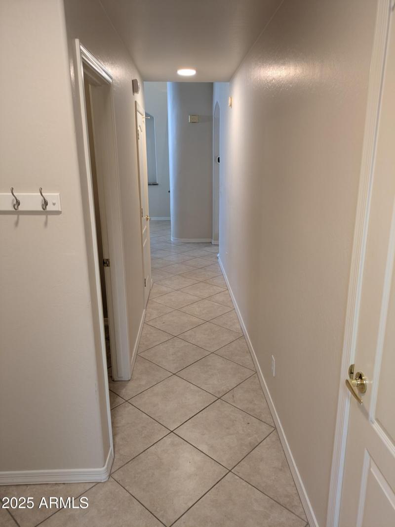 Hallway Down Stairs to Laundry Room