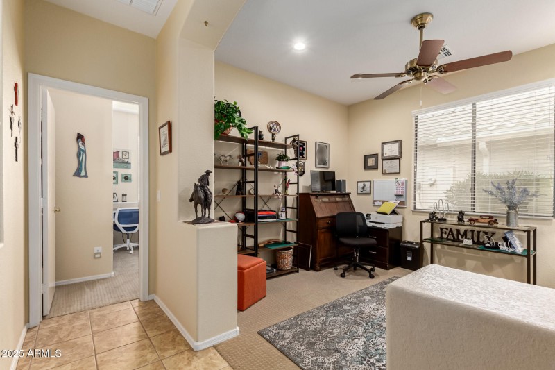 Den and entry to second bedroom