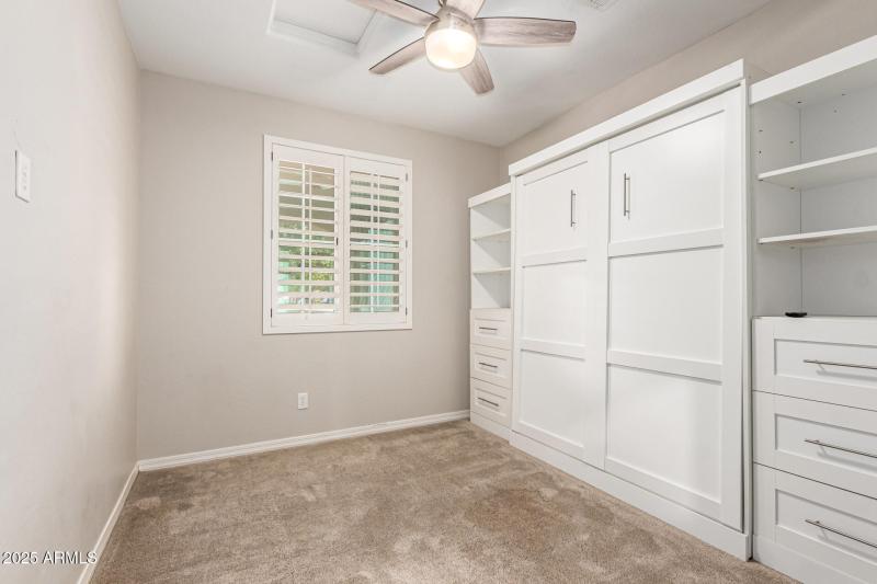 Downstairs bedroom w: wall bed