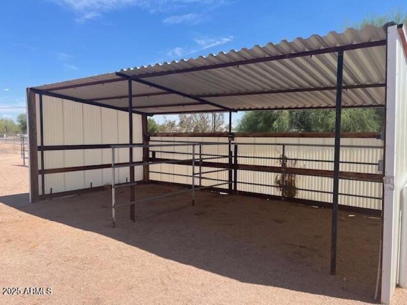 2 horse stalls covered