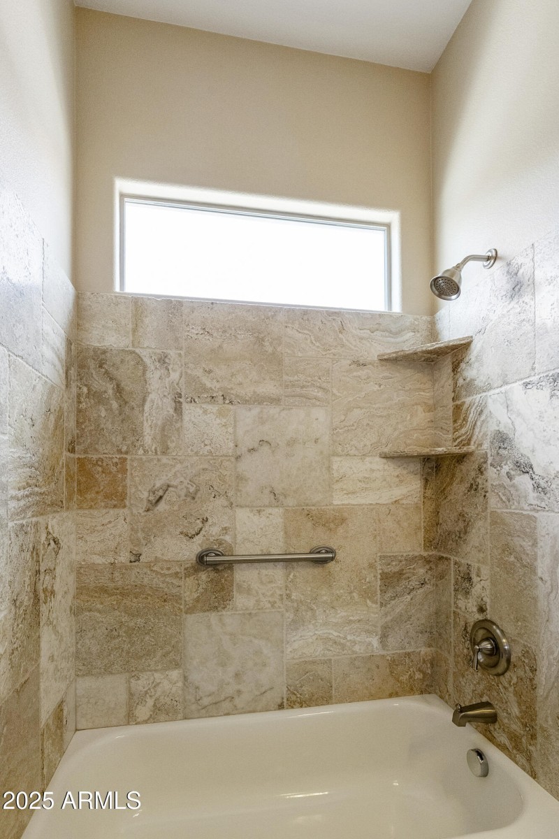 Guest bath travertine surround shower