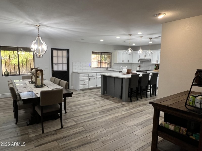 Wide view of Dining/Kitchen/Coffee Bar