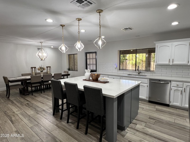 Wide angled view of Kitchen to Dining