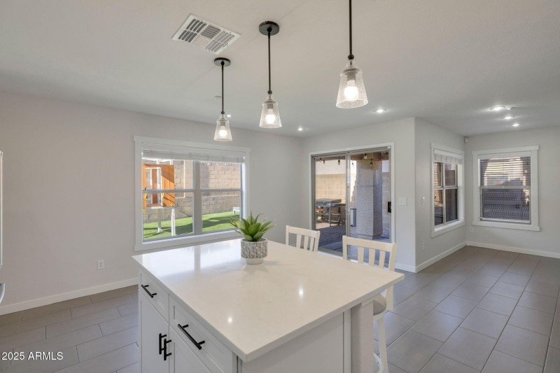 OPENS TO SPACIOUS GREAT ROOM