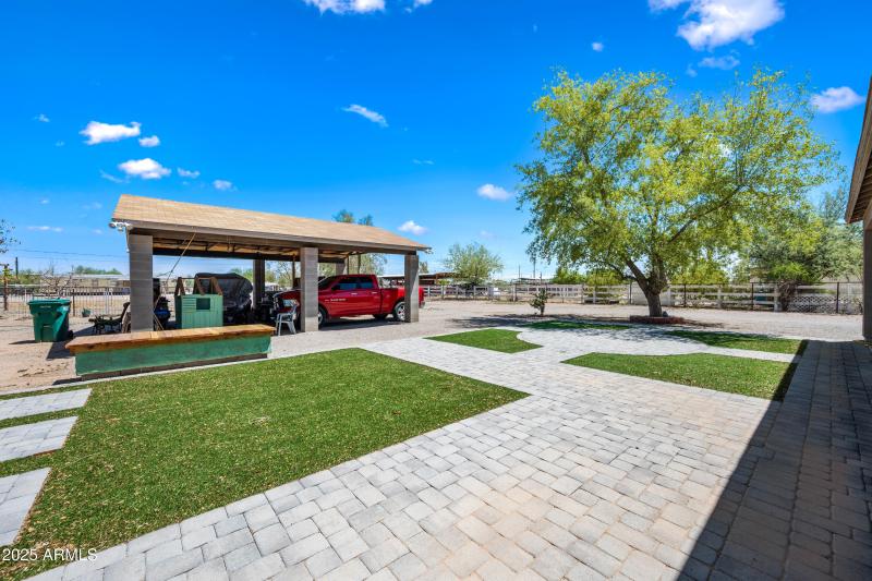 Synthetic grass and pavers