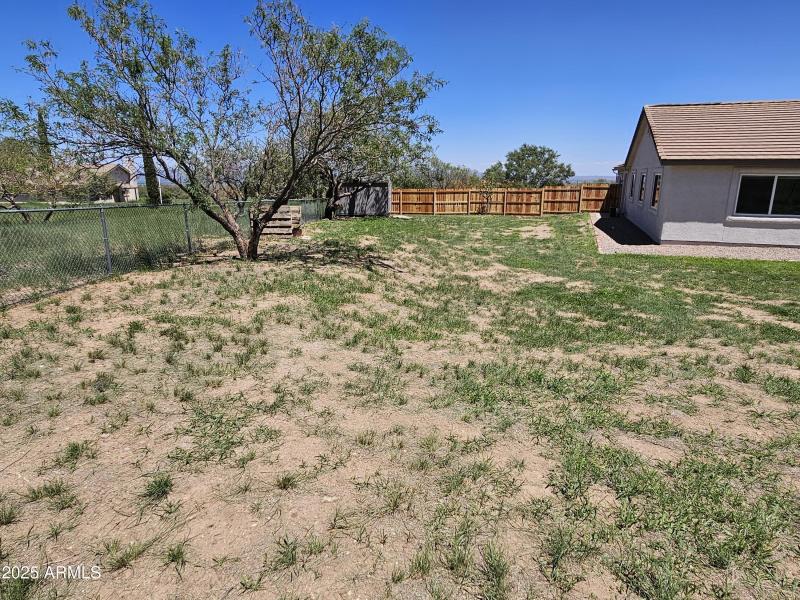 backyard storage and new fence