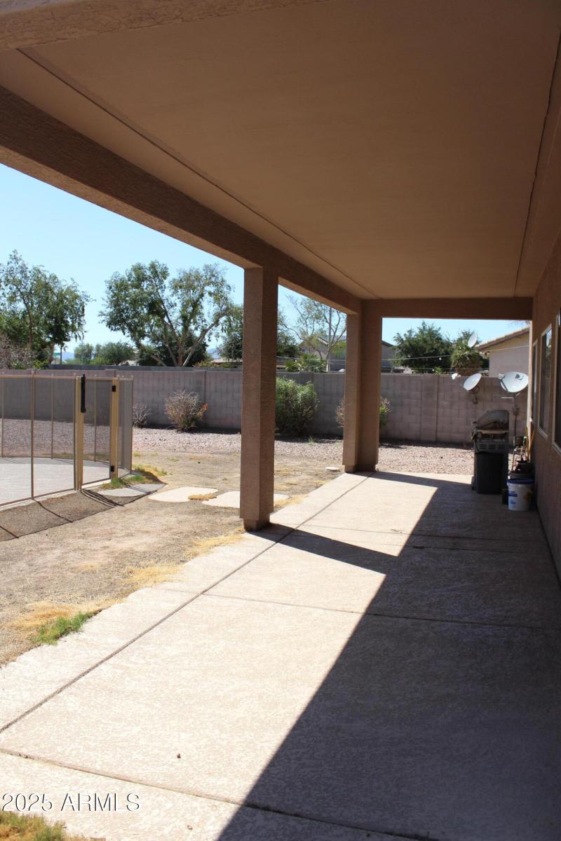 Full Rear Patio Across BAck of Home