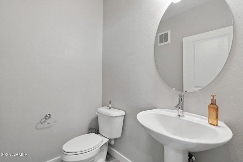 Half Bath at Entry of Unit