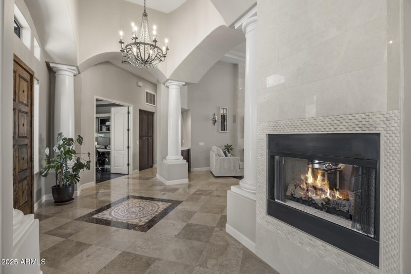 Fireplace visible from multiple rooms