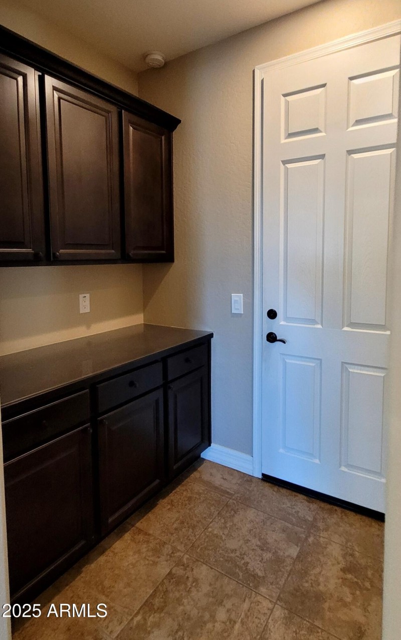 laundry room leading to garage