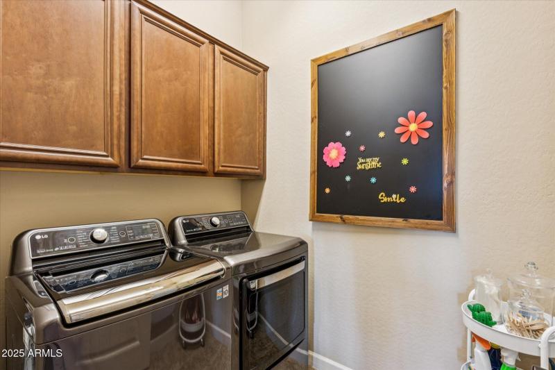 Charming Laundry Room with Chalkboard