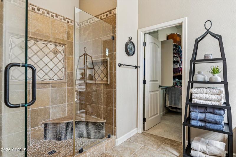 Tiled Shower and Linen Closet