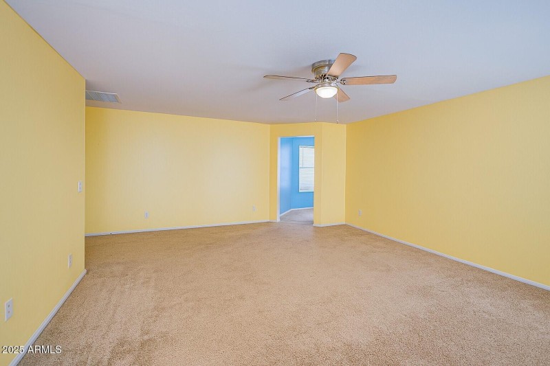 Primary bedroom into bathroom area