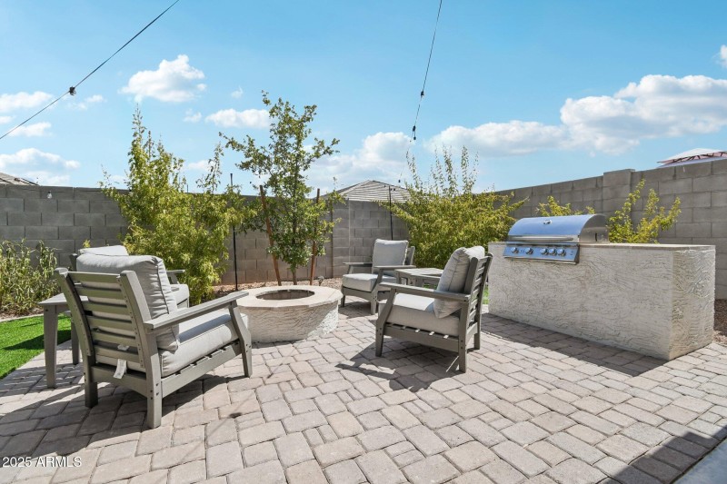 Extended patio with fire pit