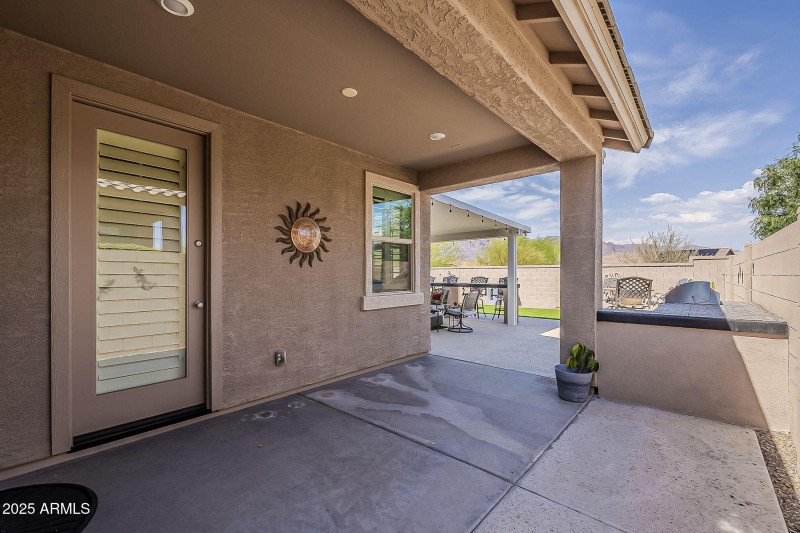 Exit to side patio and yard.