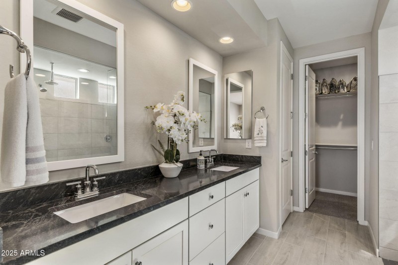 Primary ensuite with dual vanities