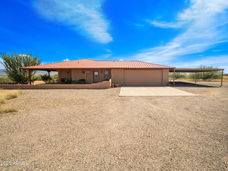 2 Car Garage + 2 Car Covered Parking