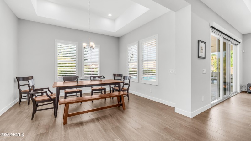 Dining area with backyard views