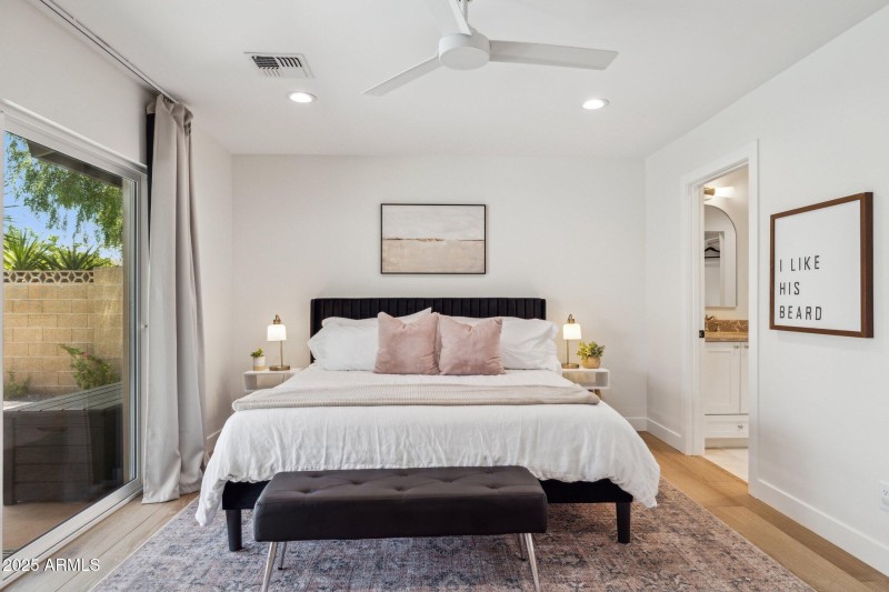 primary bedroom with a king bed