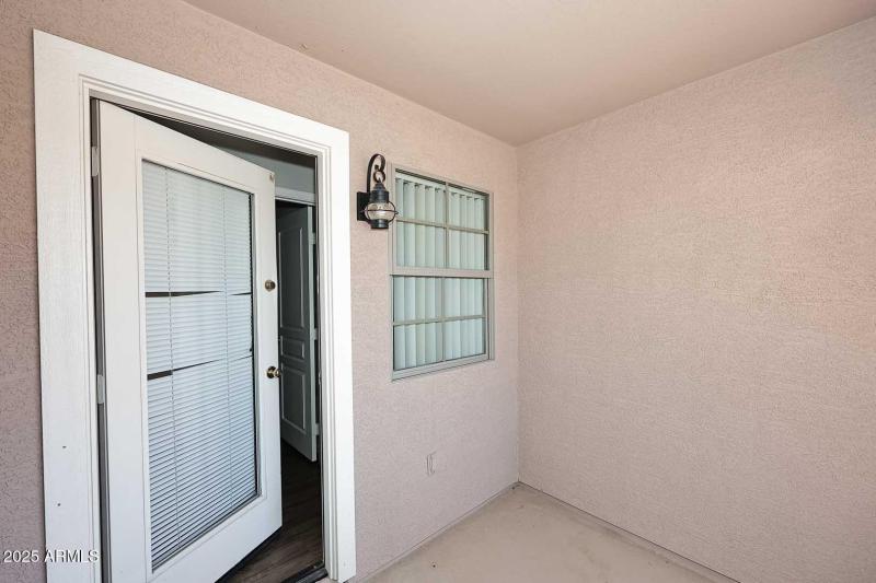 Primary Bedroom-Covered Balcony