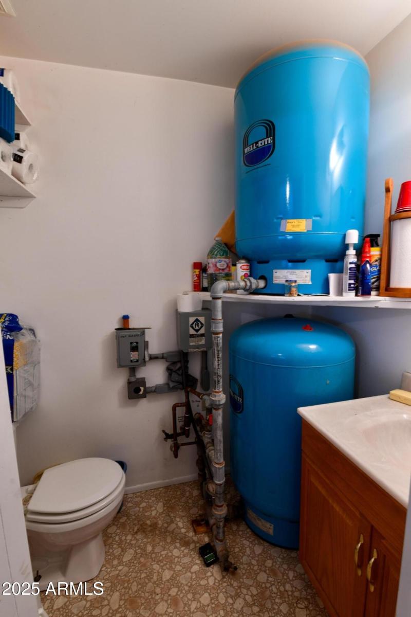 Garage half bath and well tanks