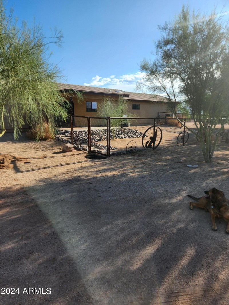 back gate with fenced yard