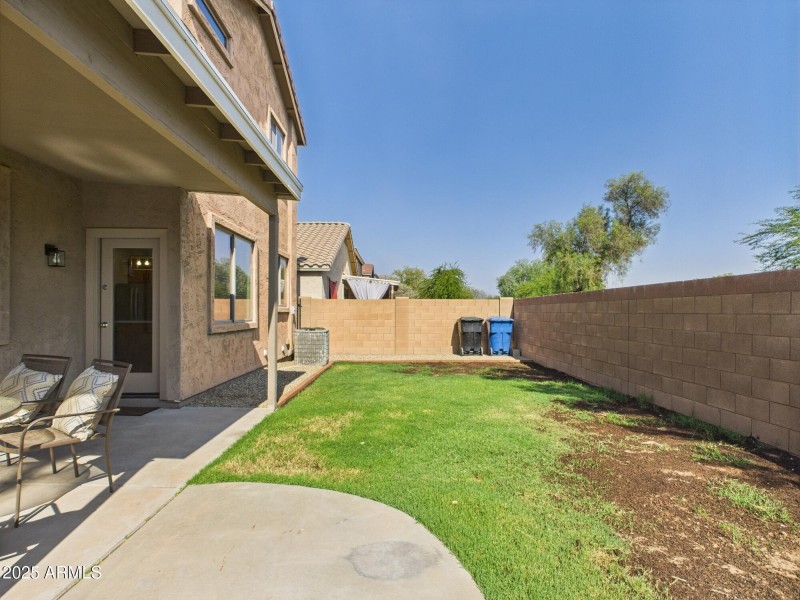 Spacious Backyard with Grass