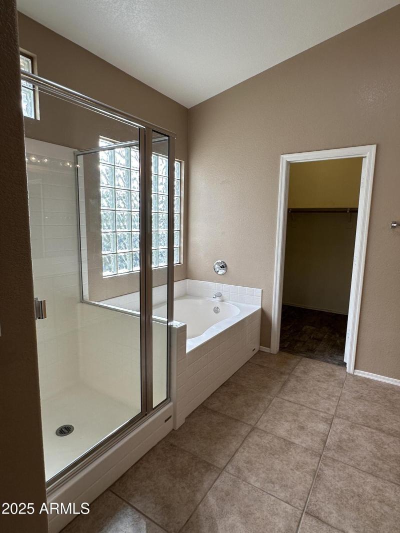 Primary bath to walk in closet