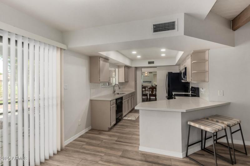 Bright Kitchen with Breakfast Bar