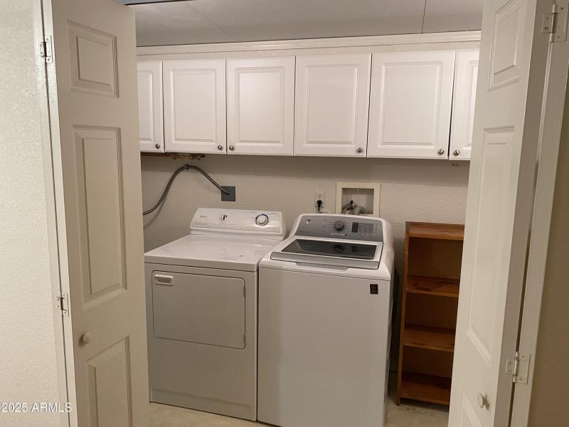 Full Laundry with Built In Cabinets