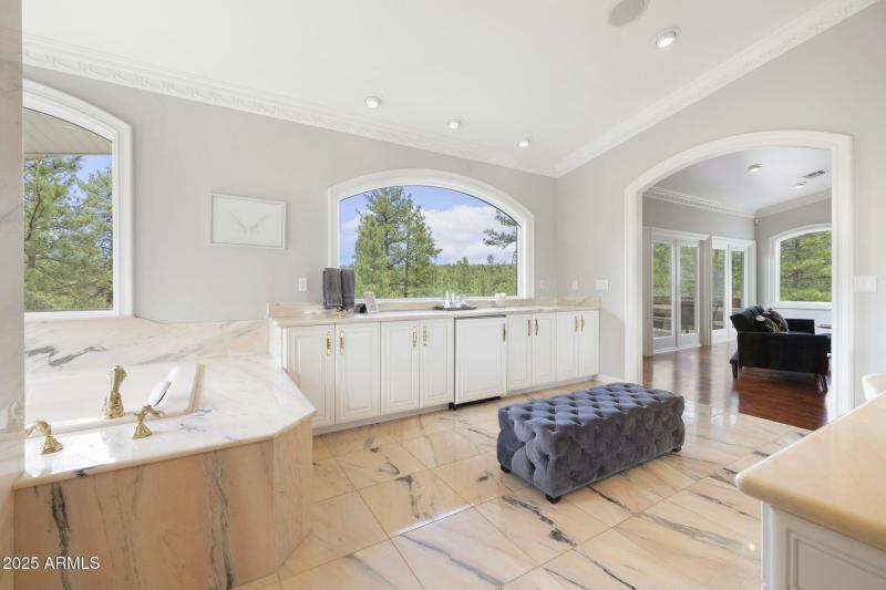 Primary Bathroom & Mini Fridge