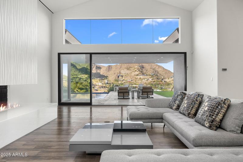 20living room with mountain views doors