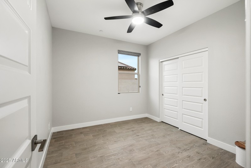 BEDROOM IN DEN OR GUEST QUARTERS