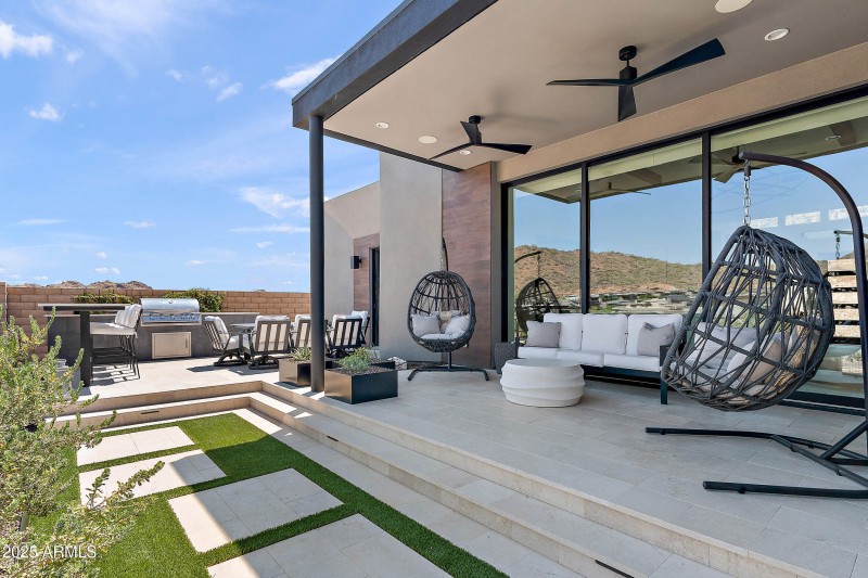 Indoor/outdoor living w/walls of glass