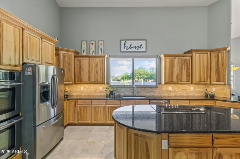 Large Window Overlooks Backyard