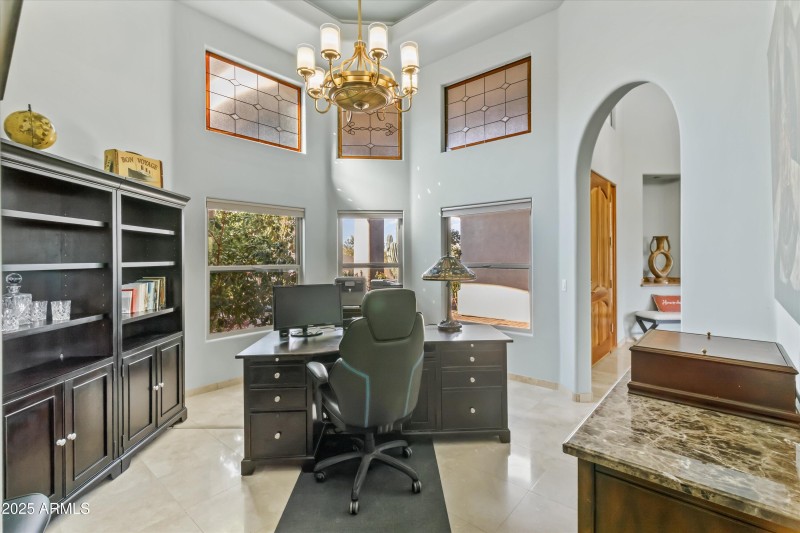 Den/Office Overlooks Front Courtyardard