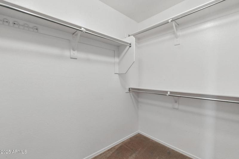 1 of 2 Primary Bedroom Walk-In Closets