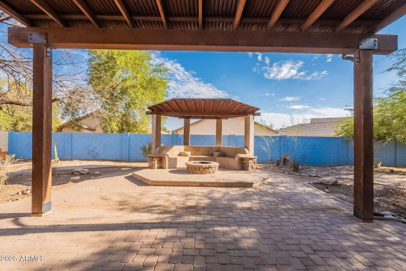 Backyard Gazebo with Firepit & Seating