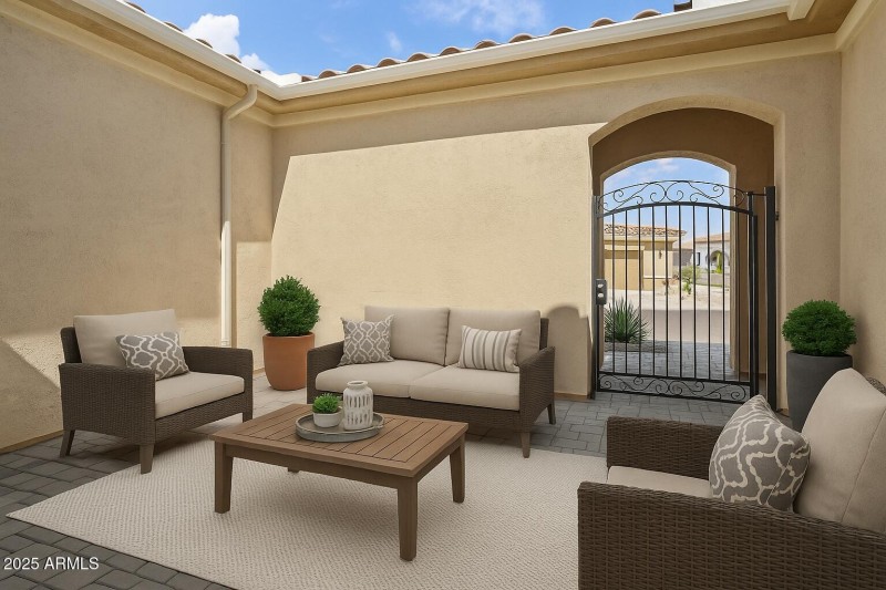 Mediterranean Patio with Arched Gateway
