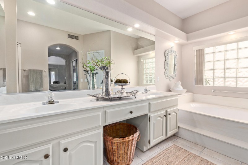 Double vanities, soaking tub