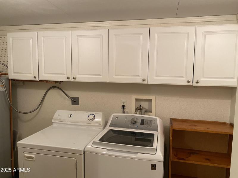 Full Laundry with Built In Cabinets