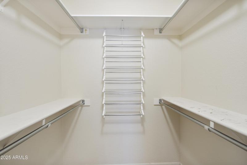 Primary Bedroom walk-in closet