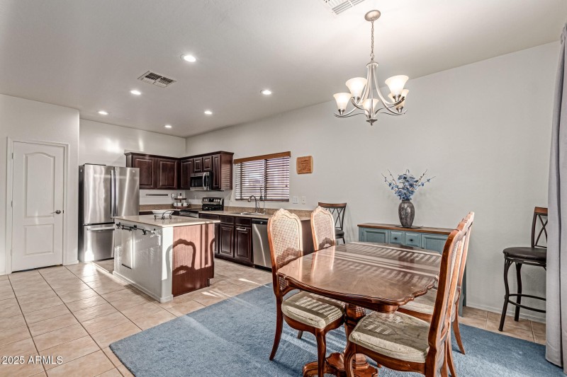 kitchen and dining with pool views