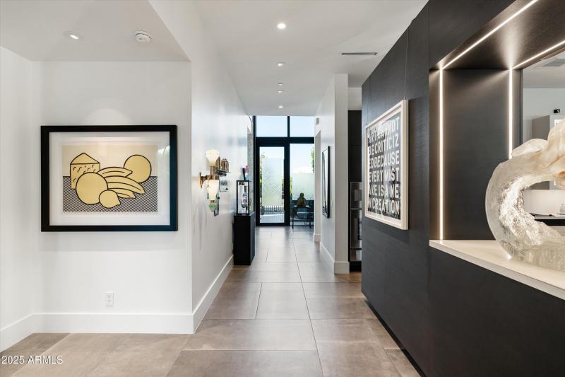 Hallway to primary wing and great room