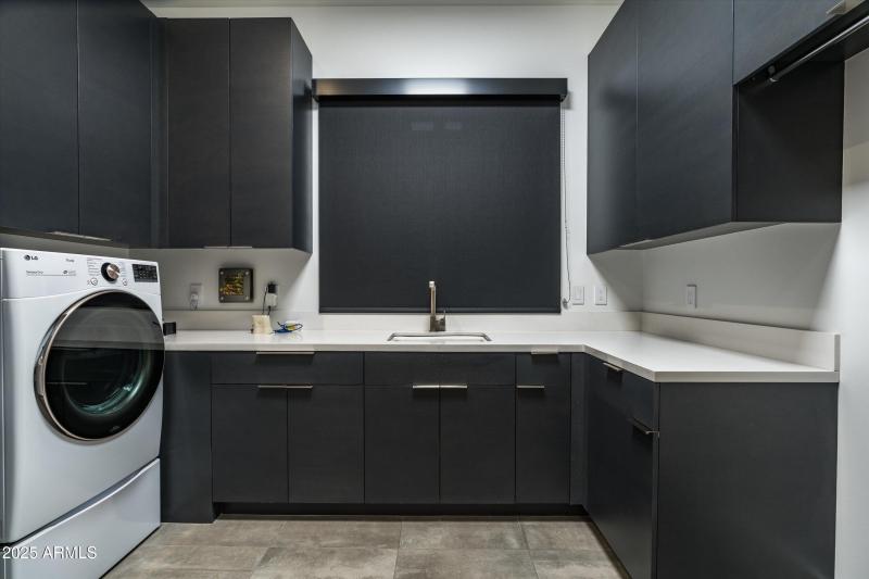 Large laundry room with extra storage