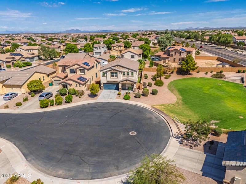 On cul de sac next to grassy area