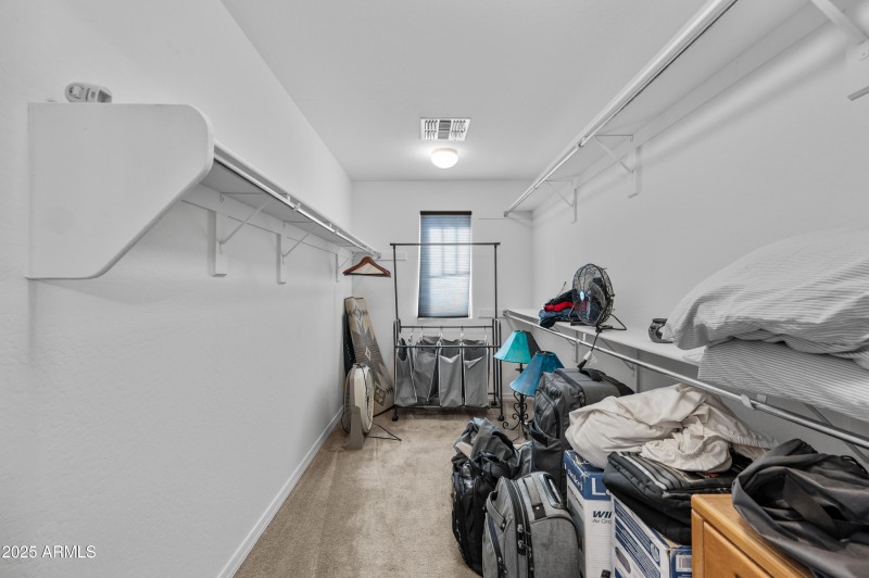 Large walk in closet in Primary